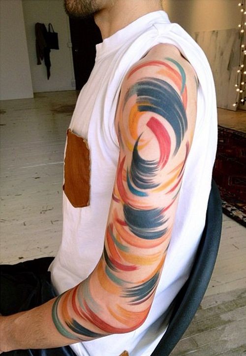 Amazing color abstraction tattoo on arm