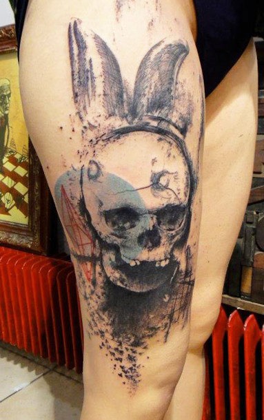 Amazing colored thigh tattoo of human skull with bunny ears