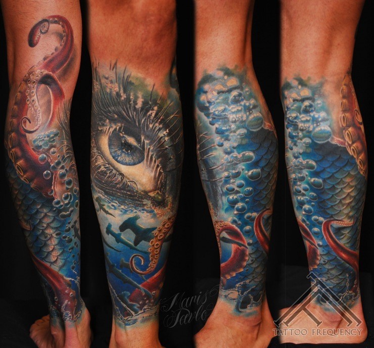 Amazing combined colored forearm tattoo of woman eye and sharks