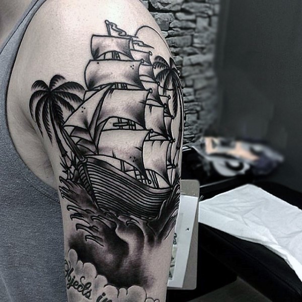 Amazing detailed ship and palm trees nice tattoo on arm