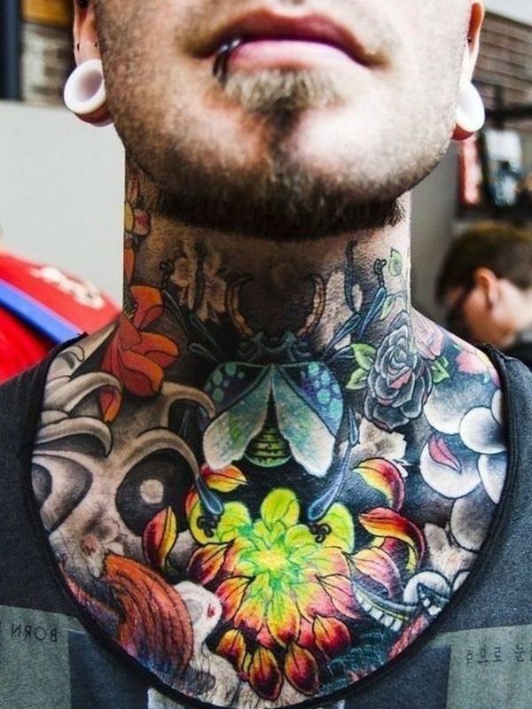 Amazing glowing like colored chrysanthemum flower tattoo on neck with bugs
