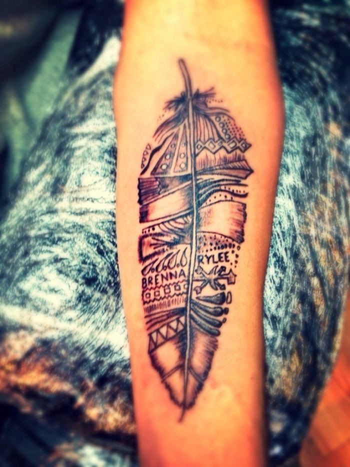 Amazing gray-ink tribal tattoo on arm