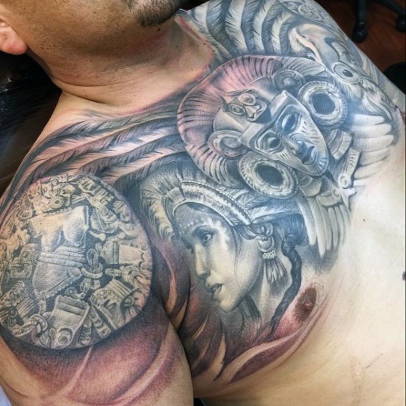 Amazing looking black and white chest tattoo of Mayan statues and woman portrait