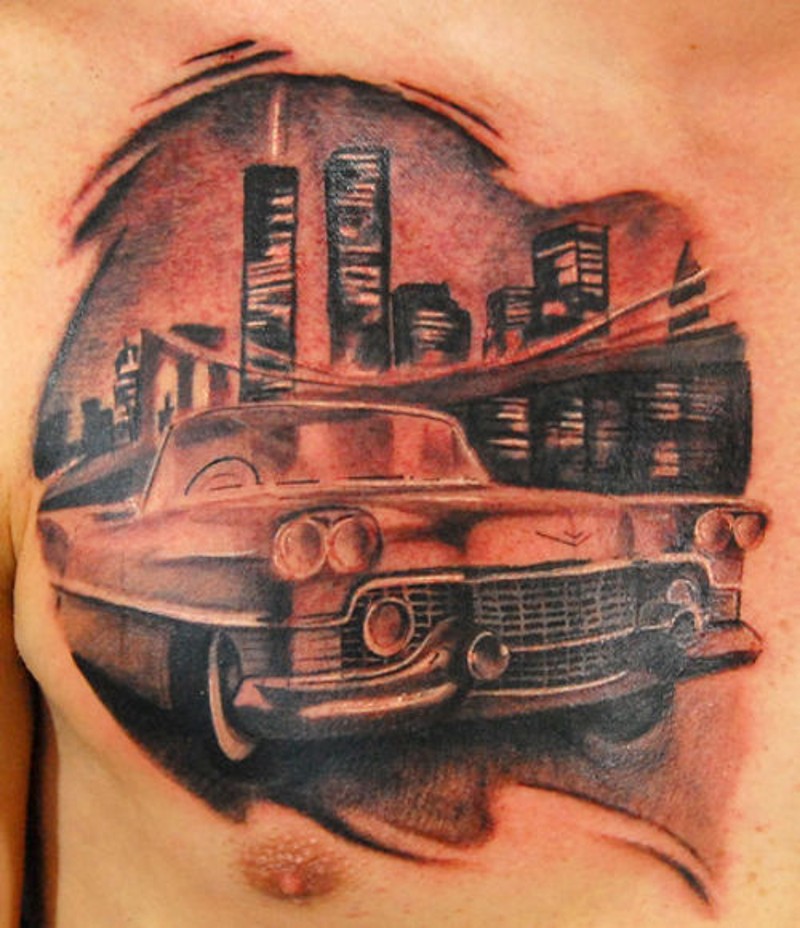 Amazing looking black ink classic car tattoo on chest with night city sights