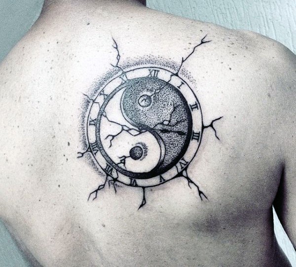 Amazing looking black ink dot style old clock tattoo stylized with Yin Yang symbol