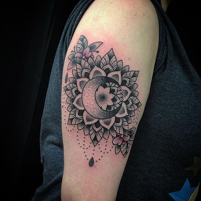 Amazing looking dot style black ink tattoo of flowers with moon
