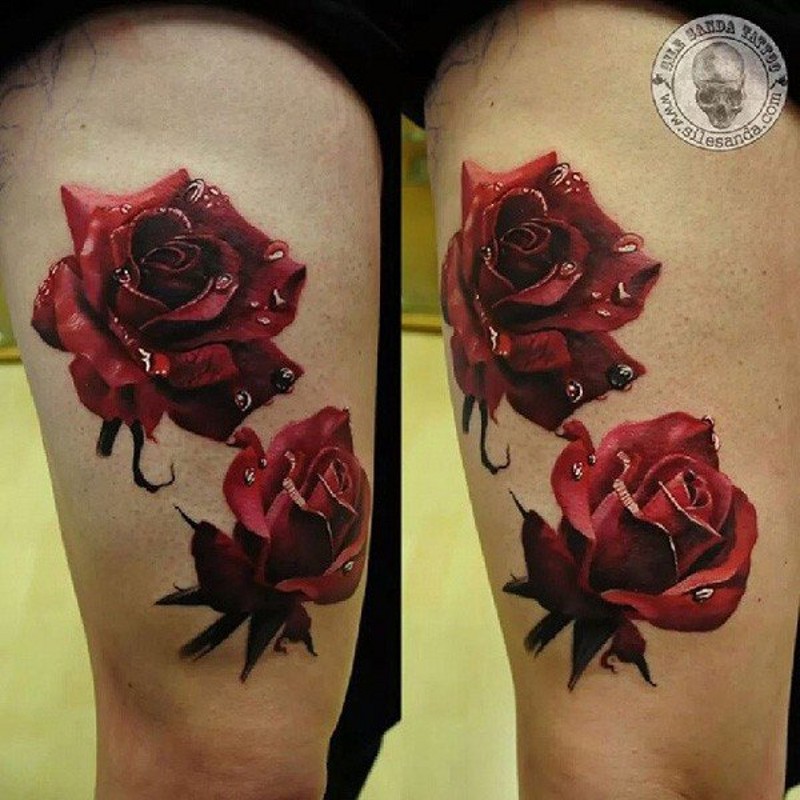Amazing looking very detailed red colored thigh tattoo of roses with water drops