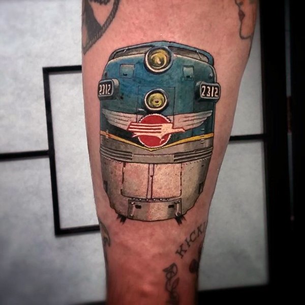 Amazing painted and colored cool modern train tattoo on leg