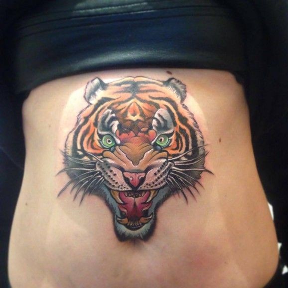 Amazing tiger head tattoo on stomach by Fabian de Gaillande