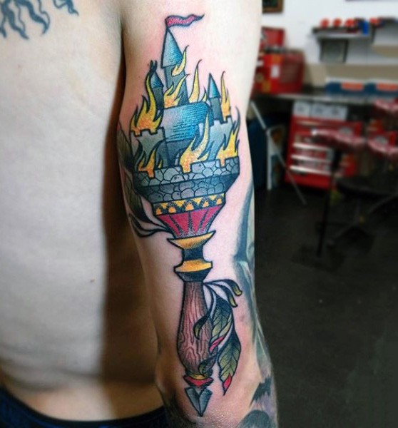 Amazing torch shaped colored burning castle tattoo on arm