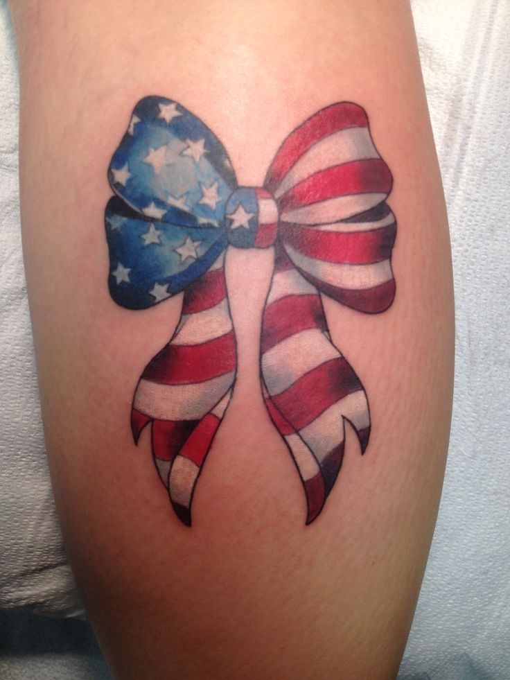 American flag tie a bow tattoo on leg for women