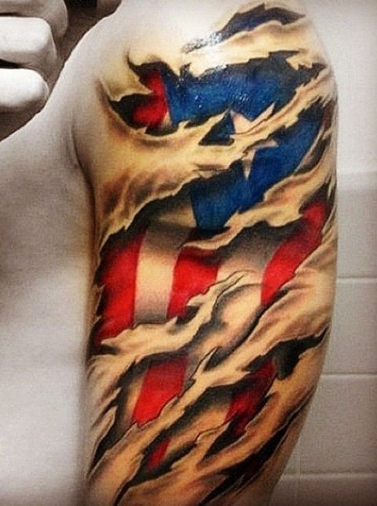 American flag under skin rip tattoo on shoulder