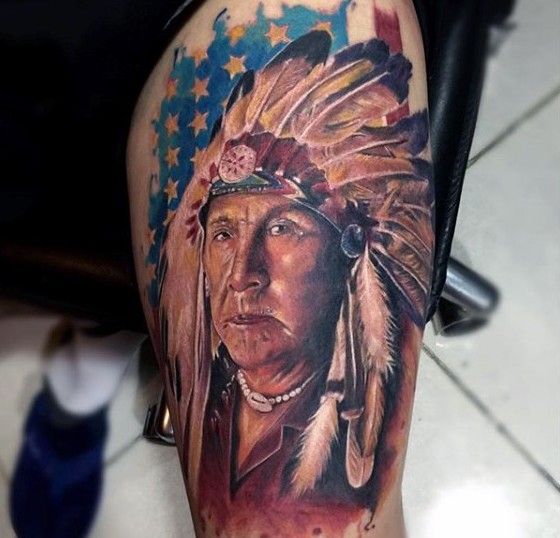 American native big colored old Indian portrait tattoo on arm stylized with national flag