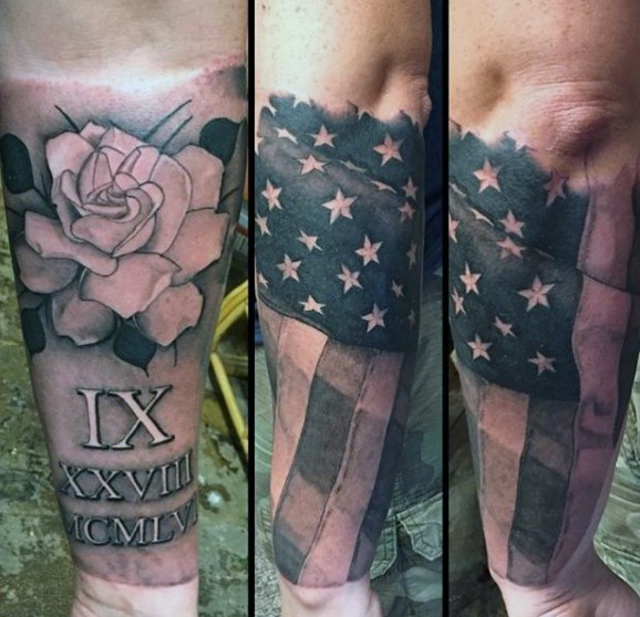 American native black and white detailed memorial tattoo with flowers and flag on arm