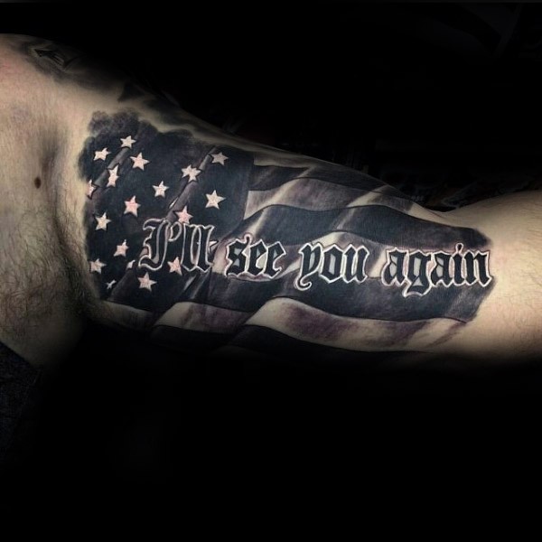 American native colored arm tattoo of flag with lettering