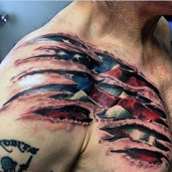 American native multicolored ripped skin with national flag tattoo on chest