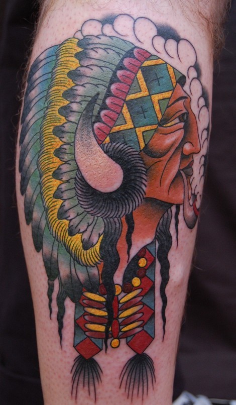 American traditional smoking Indian chief multicolored tattoo on biceps