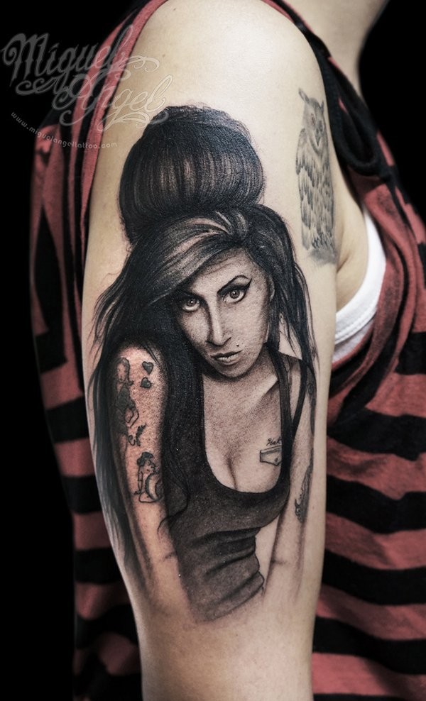 Amy Winehouse black and white 3D realistic lifelike picture tattoo on arm