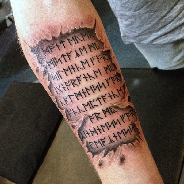 Ancient like colored forearm tattoo of lettering