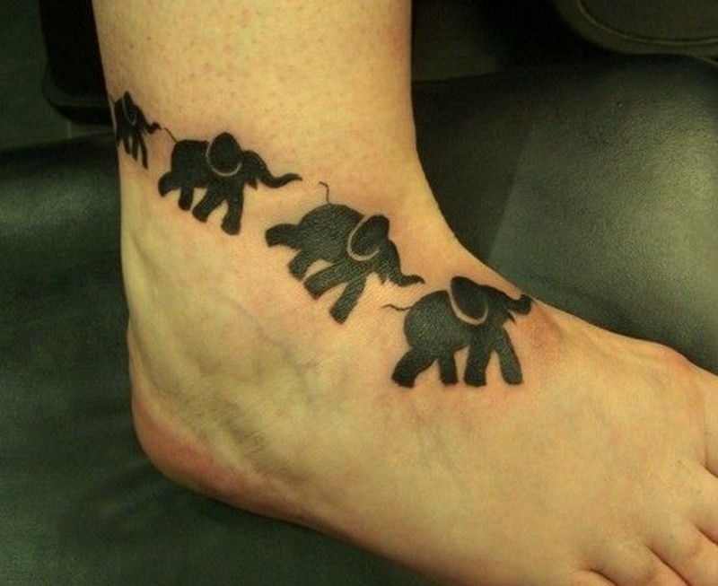 Ancient wall paintings like black ink animal elephants tattoo on leg
