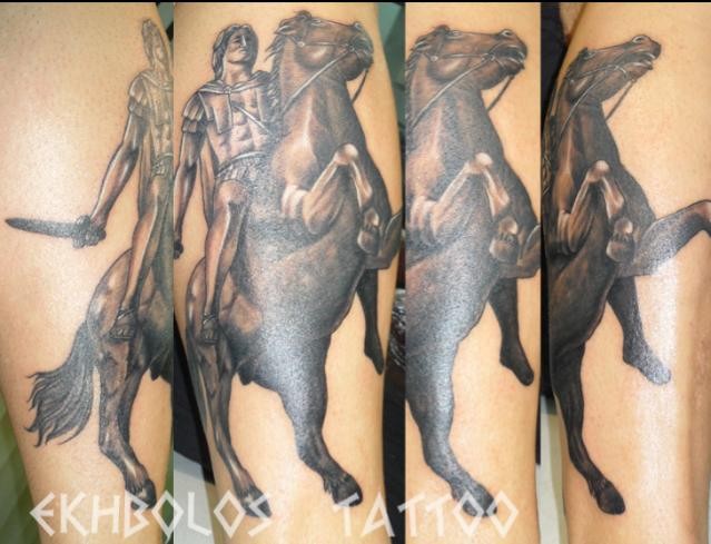 Ancient warrior with sword on horse forearm length tattoo