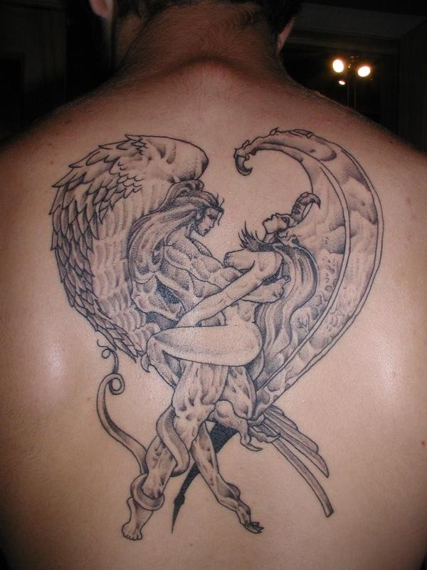 Angels and demons tattoo on whole back