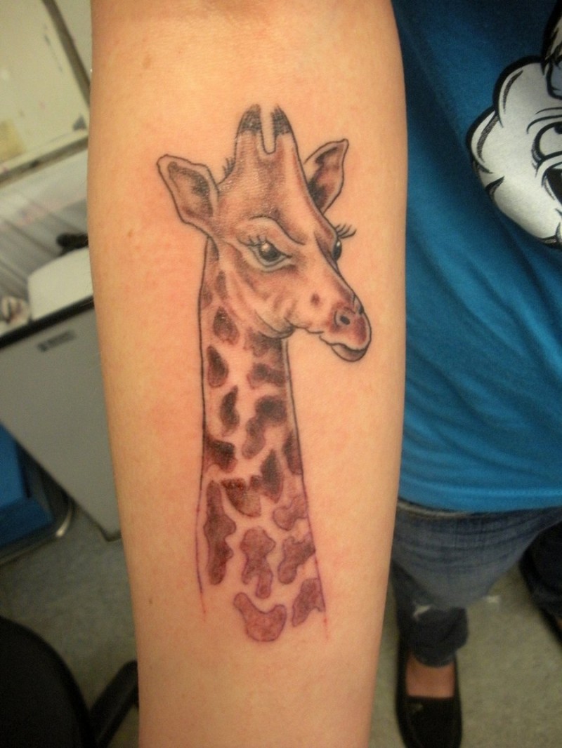 Angry giraffe tattoo face on arm