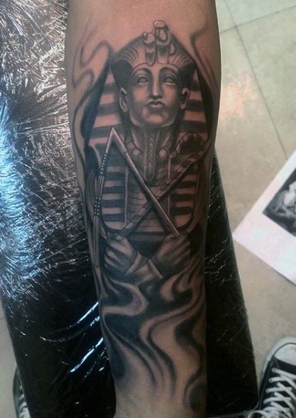Antic Egypt themed black ink forearm tattoo of Pharaoh statue