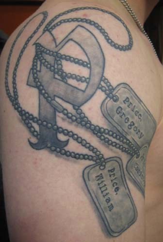 Army dog tags memorial tattoo on shoulder