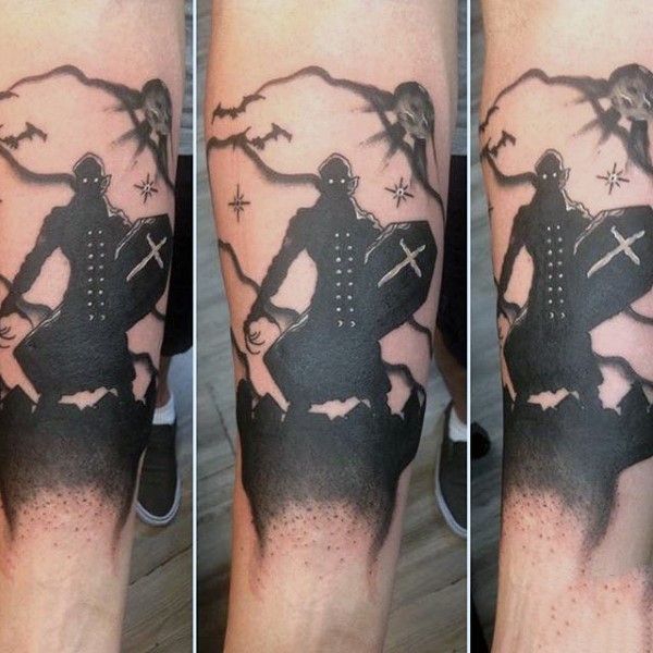 Asian cartoons like black and white mystical holy warrior tattoo on arm