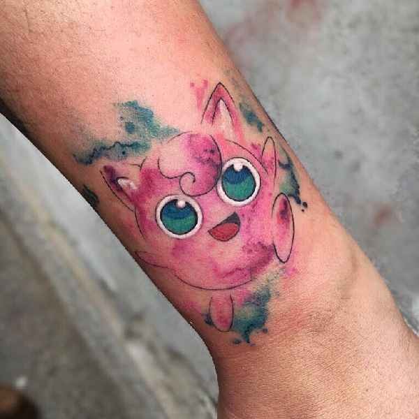 Asian cartoons themed colored arm tattoo of small creature