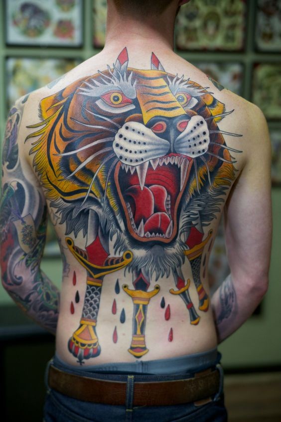 Asian style big colorful bleeding tiger with various swords tattoo on whole back