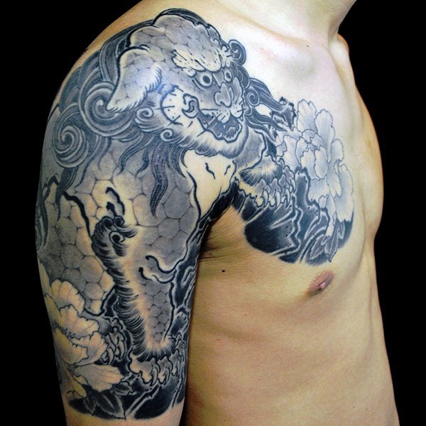 Asian style black and white big detailed tiger tattoo on shoulder with flowers