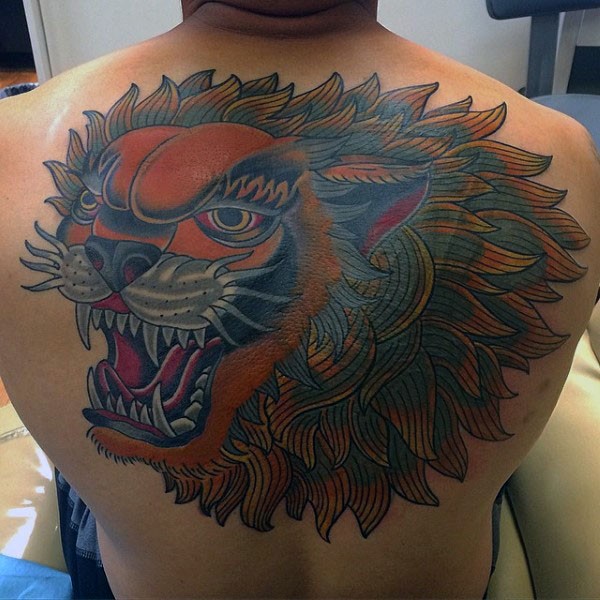 Asian style colored upper back tattoo of large lion head