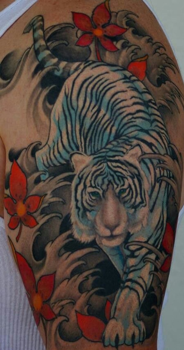 Asian style colorful shoulder tattoo of white tiger with wildflowers
