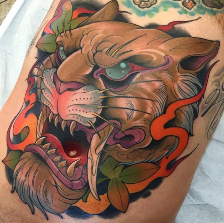 Asian style designed colored evil fantasy tiger tattoo on arm