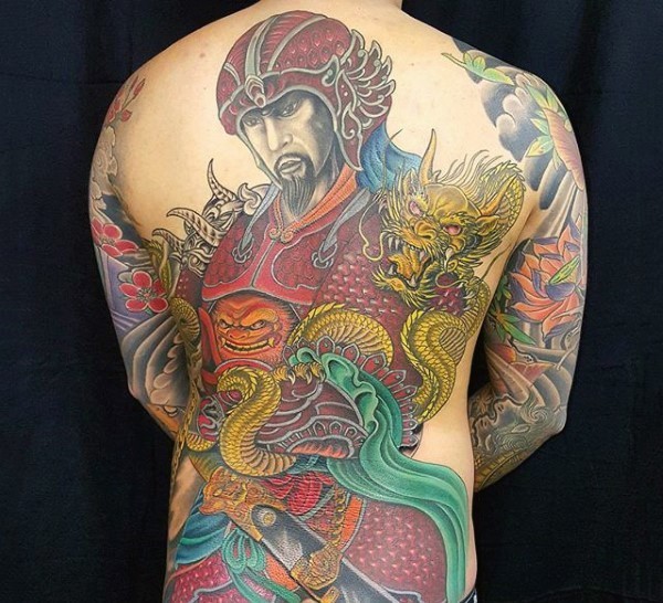 Asian style massive multicolored warrior tattoo on whole back combined with golden dragon