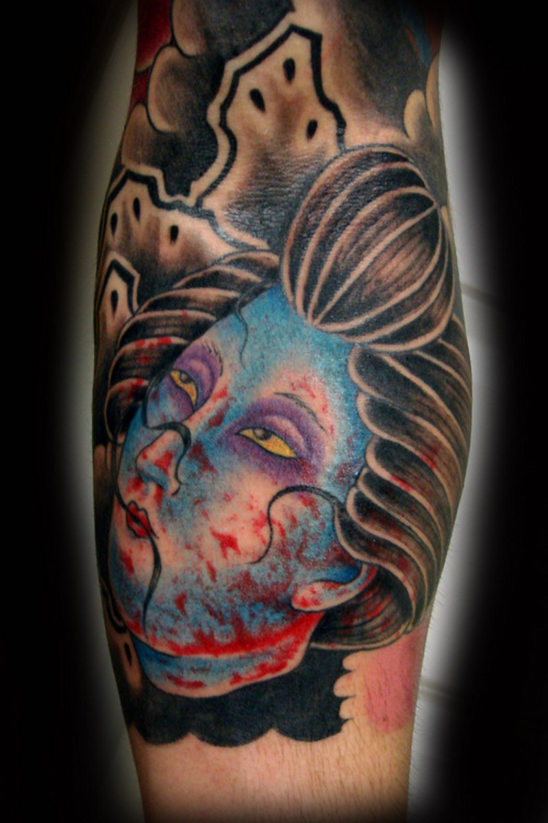 Asian traditional colorful geisha severed head tattoo on forearm
