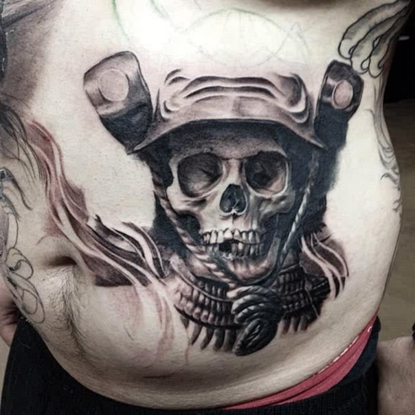 Asian traditional style colored belly tattoo of samurai skull in helmet