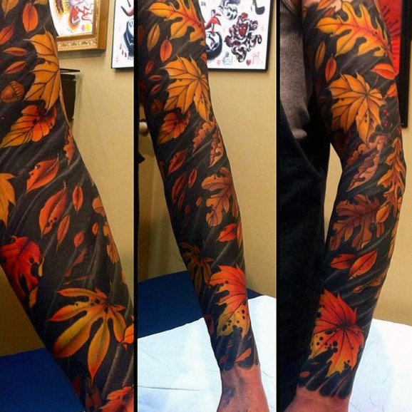Autumn colored leaves sleeve detailed realistic tattoo