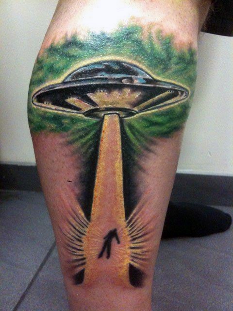 Awesome 3D like colorful alien ship with human tattoo on leg