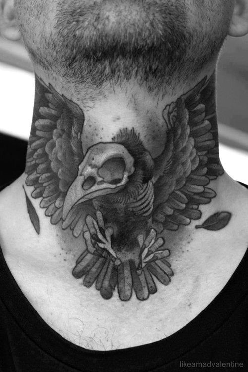 Awesome bird skull tattoo on neck