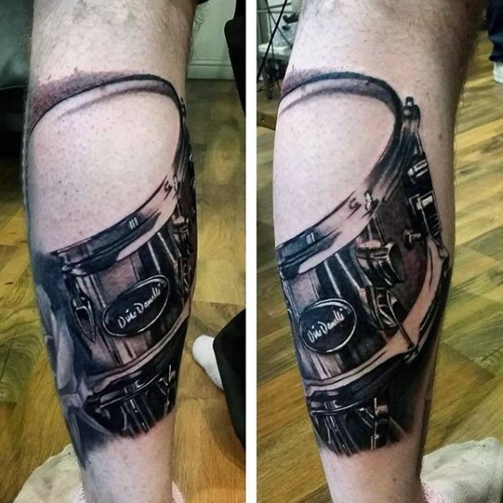 Awesome black and white 3D detailed modern drum tattoo on leg