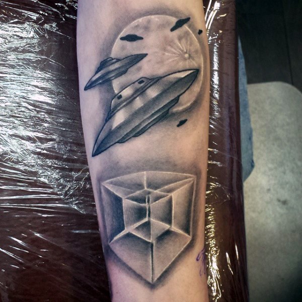 Awesome black and white alien ships with mystic cube tattoo on arm