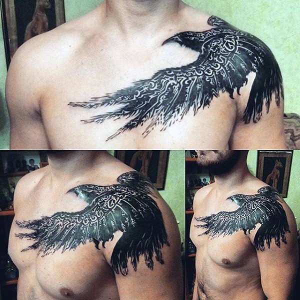 Awesome black and white tribal like big crow tattoo on shoulder