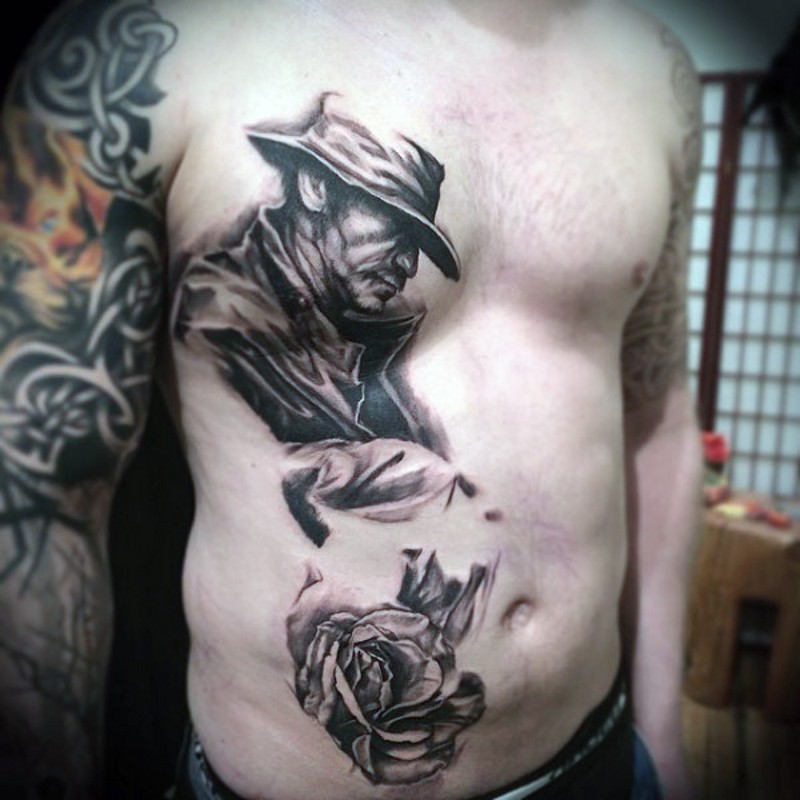 Awesome black and white western style man with flower tattoo on chest