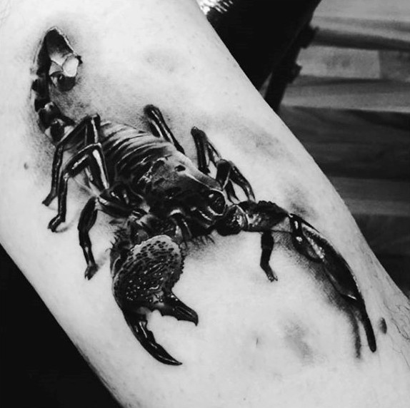 Awesome black ink 3D like black scorpion tattoo on arm