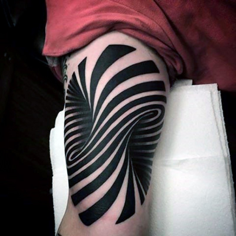 Awesome black ink hypnotic tattoo on arm