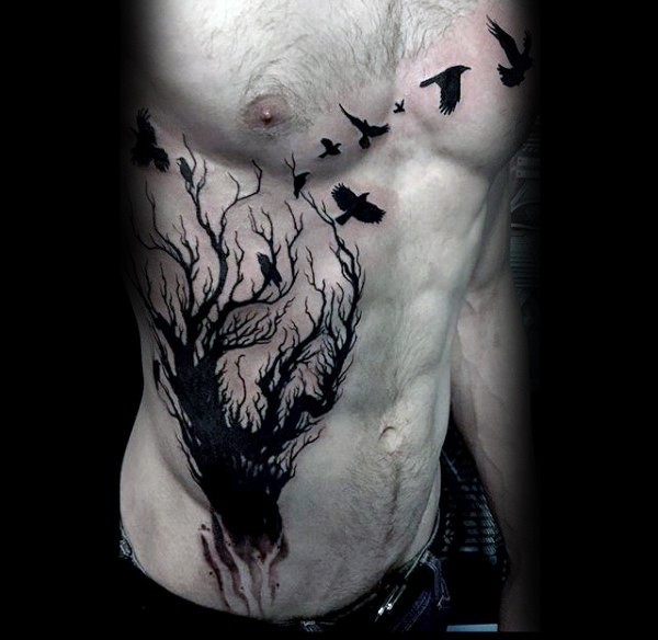 Awesome black ink side tattoo of dark tree with crows