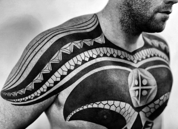 Awesome black ink simple tribal tattoo on chest and shoulders